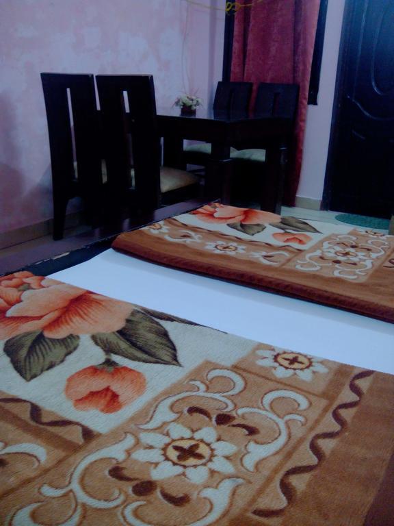 Hotel Rest Inn Lucknow Oda fotoğraf